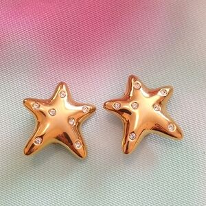 Gold star clip earrings